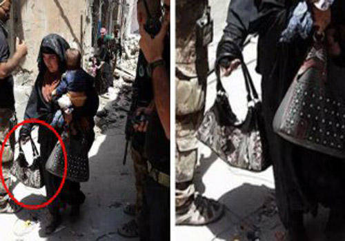 زن انتحاری داعشی با کودکی در آغوش +عکس
